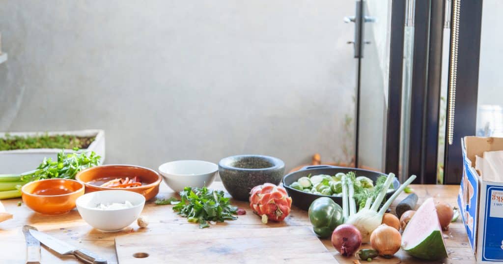 Product and bowls on kitchen table