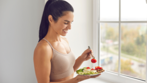 woman eating salad